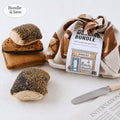 Toy bread bundle with a 'Bageri' label on a white background