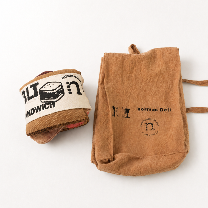 Handmade BLT sandwich play food with hand-printed fabric bag, cotton banderole and soft textile sandwich pieces.